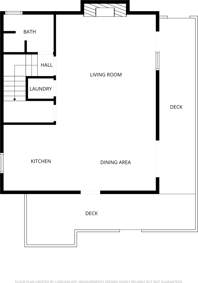 Floor plan of the main level: living room, kitchen, dining area, bath, laundry and deck